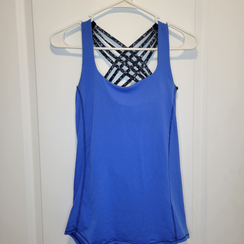 Lululemon Size 4 Free to Be *Wild 2-in-1 Tank. It's Blue with black in color.